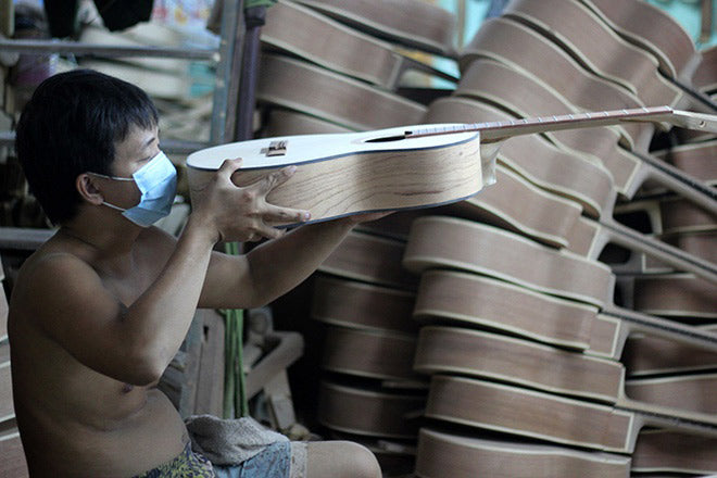 Sản Xuất Đàn Guitar