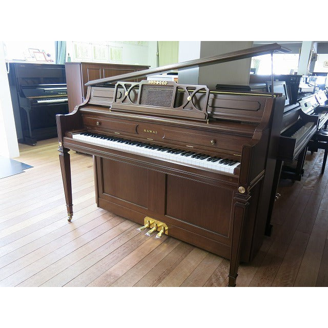 Một cây Piano vân gỗ với thiết kế mở nắp như Đại dương cầm.